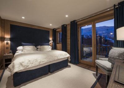 Photo of another bedroom of the luxury ski-in ski-out Catered Chalet Le Grenier with indoor pool for 12 people to rent in Méribel for rental with In-Luxe Chalets France