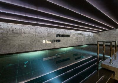 The indoor heated swimming pool at Luxury ski-in ski-out chalet for large group chalet Perce Neige for 14 adults and 4 children with pool and a chef to rent in Courchevel 1850 with In-Luxe Chalets France