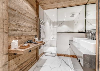 En-suite Bathroom Photograph luxury Chalet Namaste for 14 people in Courchevel 1850 for rental with In-Luxe Chalets France