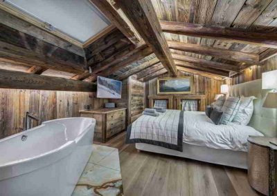 A Bedroom at Luxury Chalet Crystal White Megeve for 10 adults and 2 children | Luxury Chalet Rental Megeve with In-Luxe Chalets France