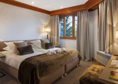 Bedroom picture at Luxury ski-in ski-out apartment rental Courchevel 1850 ST-BA for 8 people with services, a Spa, Apartment rental in Courchevel 1850 with In-Luxe Chalets France