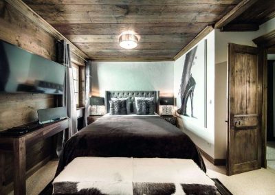 Bedroom view at Luxury ski-in ski-out chalet for large group chalet La Vizelle in Courchevel 1850 Luxury Chalet Rental with In-Luxe Chalets France