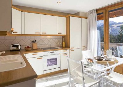 Kitchen at Luxury ski-in ski-out apartment rental Courchevel 1850 ST-BA for 8 people with services, a Spa, Apartment rental in Courchevel 1850 with In-Luxe Chalets France