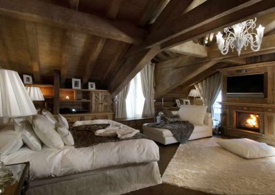 Master Bedroom Luxury Chalet Grande Roche Courchevel 1850, for 14 people with fitness, sauna, steam room, outdoor jacuzzi, cinema, massage room and a chef; Chalet rental Courchevel 1850 with In-Luxe Chalets France