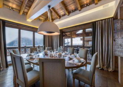 Dining room view at Luxury Chalet Les Bastidons Courchevel 1850 for rental with In Luxe Chalets France