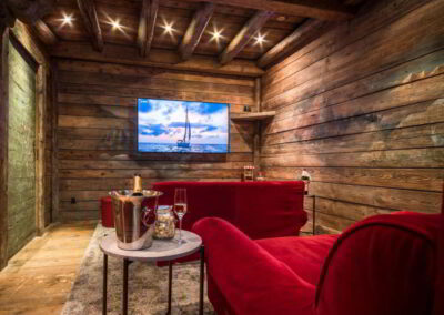 Cinema Room Luxury catered ski-in out Chalet Montana Courchevel 1850 for rental with In Luxe Chalets France