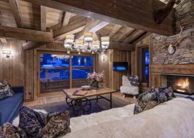 Sitting area fireplace at Luxury self-catered ski-in out apartment Valchar in Val d'Isere for rental with In Luxe Chalets France