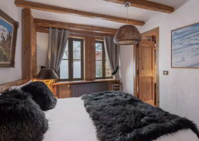 Fourth bedroom photo at Luxury self-catered ski-in out Chalet Alice Val d'Isere for rental with In Luxe Chalets France