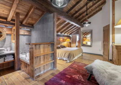 First bedroom photo at Luxury self-catered ski-in out Chalet Alice Val d'Isere for rental with In Luxe Chalets France